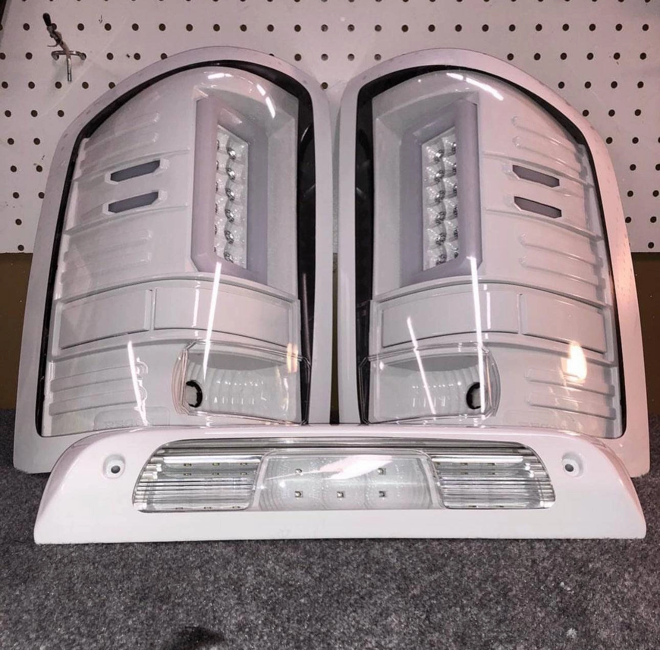 2014-2019 GMC Sierra 1500/2500/3500 RECON Clear Lens (Paintable) OLED Tail Lights (Replaces Factory Halogen Tail Lights)
